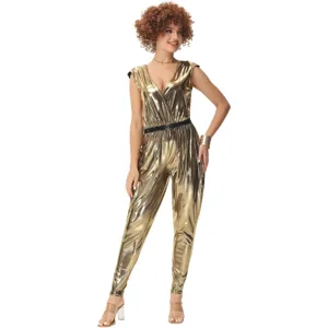 Metallic gold fabric detail of vintage 80s disco party jumpsuit, shiny stage costume texture.