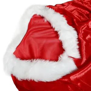 Close-up detail of red velvet and white plush trim for Christmas costume and holiday apparel.