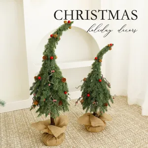 Decorazione tavola albero di Natale verde curvo con pigne e base in tela di iuta