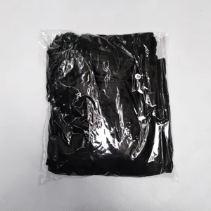Detailed view of the black adult costume packaged in a transparent bag with size M label.