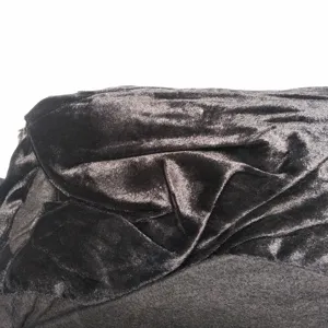 Black velvet fabric detail for Halloween cosplay costume, soft texture and dark gothic style.