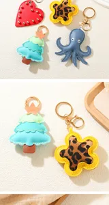 Selection of cute PU leather keychains in octopus, flower, and Christmas tree shapes