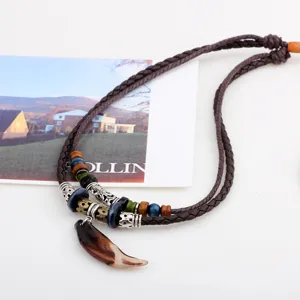 Vintage ethnic men's braided necklace with brown tooth pendant and colorful beads