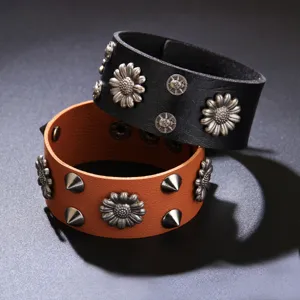 Vintage punk style wide leather bracelets featuring metal sunflower and spike rivets