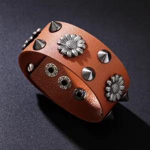 Vintage punk brown leather wide cuff bracelet with sunflower ornaments and metallic studs.