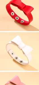 Vue détaillée de bracelets nœud en cuir PU colorés avec boutons-pression réglables