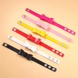 Lot de bracelets en cuir PU multicolores avec nœud et boutons-pression réglables