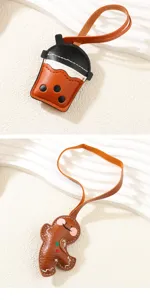Detail view of cute PU leather bubble tea and gingerbread man bag charms for women accessories