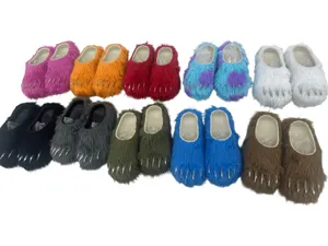 Collection of furry claw slippers in various vibrant colors for a fun and cozy indoor look.