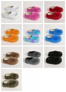 Detailed view of ten colorful faux fur animal claw mule slippers with thick platform soles.