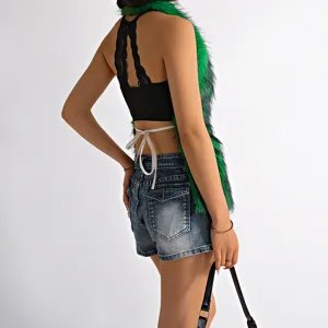 Detailed view of the back of a sexy open-back green Mongolian fur halter top