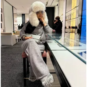 Faux raccoon fur white trapper hat for Y2K fashion winter styling and skiing activities