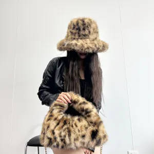Chic leopard print faux fur bucket hat and hobo bag set designed for winter fashion