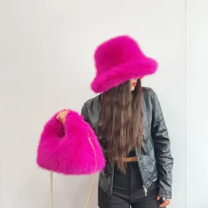Vibrant pink faux fur bucket hat and matching chain hobo bag set for women.
