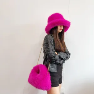 Stylish hot pink faux fox fur bucket hat and matching hobo chain bag set for women fashion