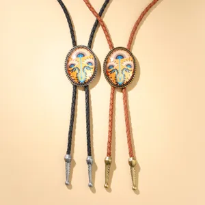 Western cowboy bolo tie with braided leather cord and floral glass cabochon pendant
