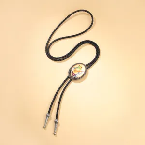 Western cowboy bolo tie with whimsical frog playing guitar illustration and black cord