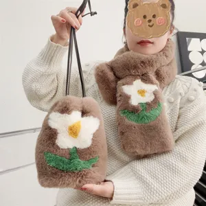 Detailed view of plush cherry blossom phone bag and matching scarf set for winter.