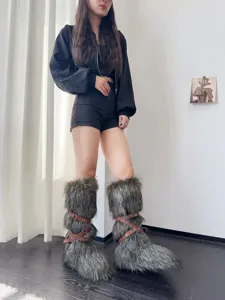 Stylish women's faux fur y2k punk snow boots with decorative brown buckle straps detail