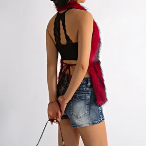 Back view detail of a vibrant red Mongolian faux fur halter top with sexy open back