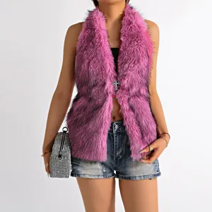 Detail view of pink Mongolian faux fur halter top featuring a metal cross pendant