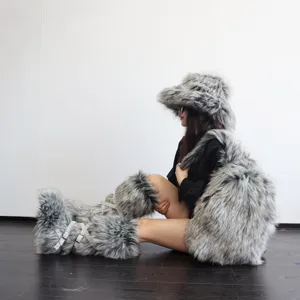 Detailed view of a Y2K style faux raccoon fur backpack worn with matching fur accessories.