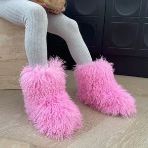 Bottes douillettes en fausse peau de mouton rose vif pour enfants avec texture bouclée