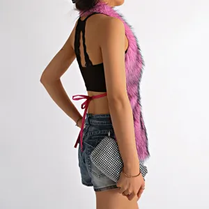 Side view of a pink Mongolian faux fur halter top with sexy backless lace-up detail.