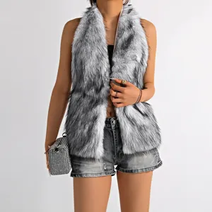 Detail shot of a sexy backless grey faux fur halter vest featuring a silver cross clasp.