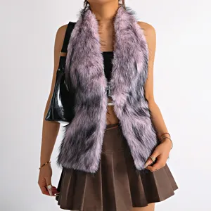 Close-up of pink and black faux fur halter vest with silver cross pendant detail