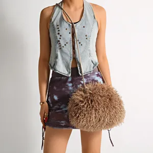 Plush faux fur cloud bag with a furry spherical design and long crossbody strap.