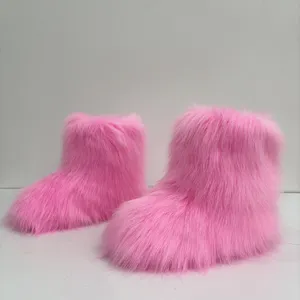 Warme rosa Kunstpelz-Schneestiefel für Kinder mit flauschigem Langhaar-Design für Winter.