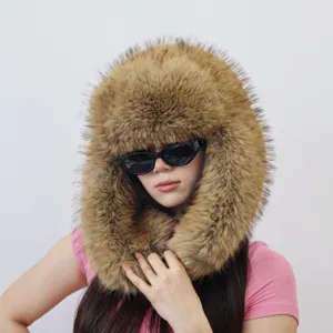 Detailed macro view of an oversized faux fur Ushanka hat in natural brown for Y2K style.