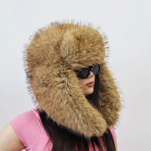 Close-up of exaggerated Y2K style faux raccoon fur trapper hat in brown