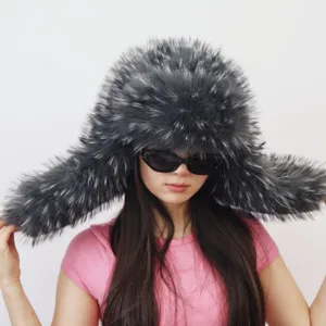 Close-up of model wearing an oversized grey faux fur trapper hat in Y2K style aesthetic