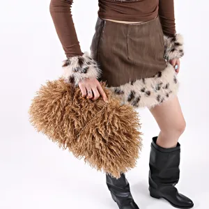 Large brown curly faux fur cloud clutch bag with an elegant gold chain strap detail
