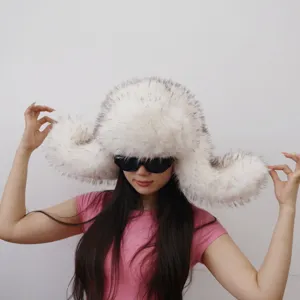 Oversized white faux fur ushanka hat with black tips, fluffy Y2K style winter ski cap