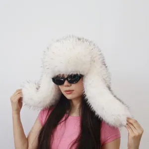 White plush faux raccoon fur ushanka ski hat with exaggerated Y2K style for winter