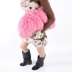 Large pink fluffy faux fur cloud bag with elegant gold chain strap for stylish women