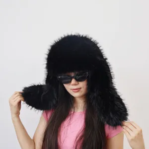 Detailed macro shot of an oversized black faux fur trapper hat in Y2K fluffy style