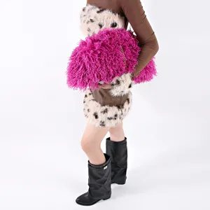 Detailed macro view of vibrant pink curly faux fur cloud bag showing shaggy plush texture