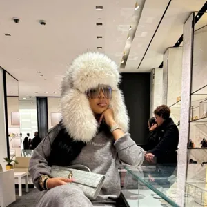 White oversized faux fur fluffy trapper hat in Y2K blogger style for luxury winter fashion