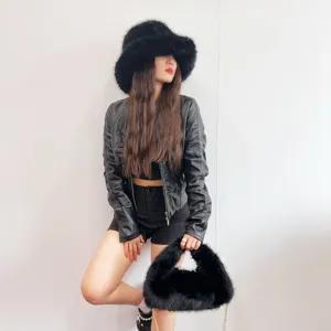 Chic faux fox fur bucket hat and matching hobo bag set in black for winter fashion