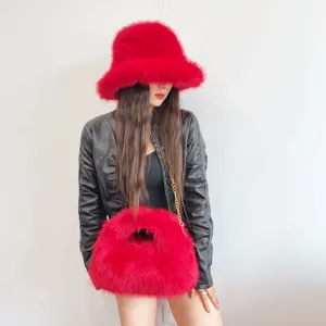 Vibrant red faux fox fur bucket hat and matching hobo handbag set with chain detail