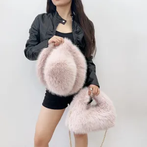 Stylish pink faux fox fur bucket hat and matching hobo bag set with elegant gold chain strap