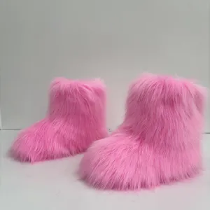 Detailansicht der rosa Kunstfuchs-Schneestiefel für Kinder mit langer flauschiger Textur