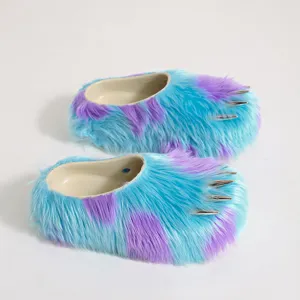 Stylish blue and purple faux fur claw slippers featuring metallic silver monster nails