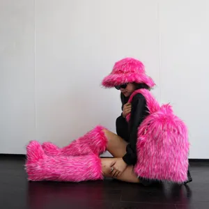 Macro view of bright pink faux raccoon fur texture on a trendy Y2K style backpack design