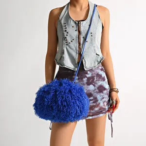 Electric blue furry crossbody bag for women featuring a cloud-like texture detail