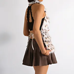 Close-up of a stylish leopard print faux fur halter vest with an open back design